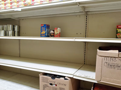 Empty shelves at Whitney Food Bank